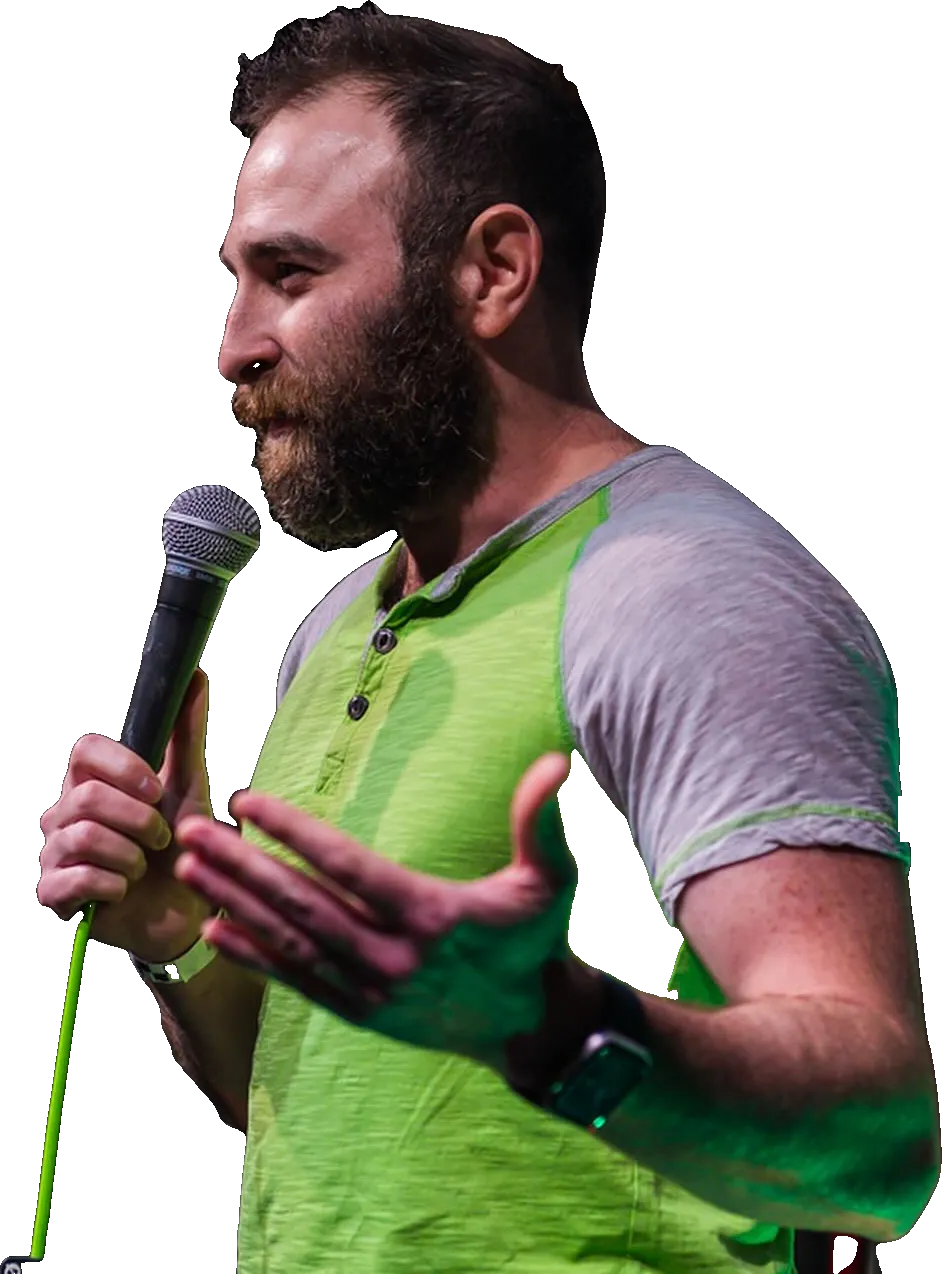 Boris Khaykin on stage with a microphone, mid-joke